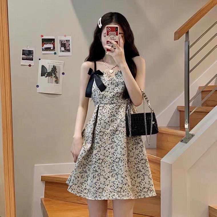 Small floral dress women's summer new French college style short skirt bow suspender A-shaped skirt