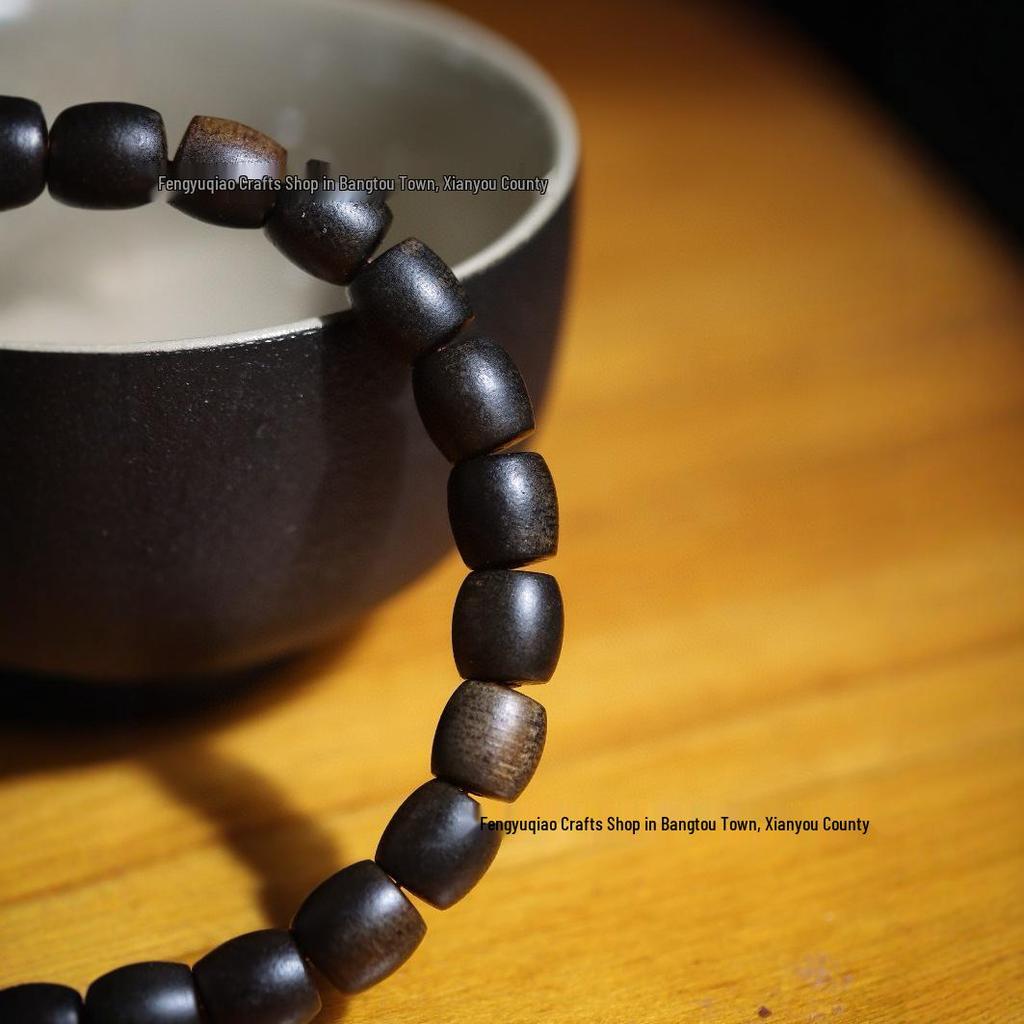 Agarwood Black Qinan High Oil Sinking Bracelet: 108 Bead Buddhist Rosary with Round and Barrel Beads, High-Quality Woody Hand Jewelry.