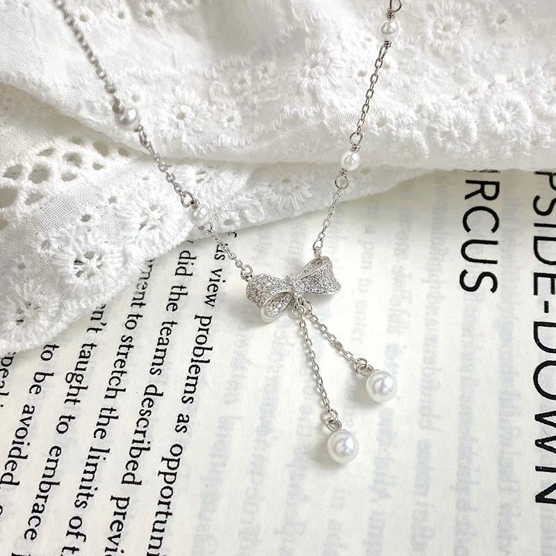 Легкое роскошное жемчужное ожерелье с бантом для женского меньшинства, элегантная и изящная ключичная цепочка