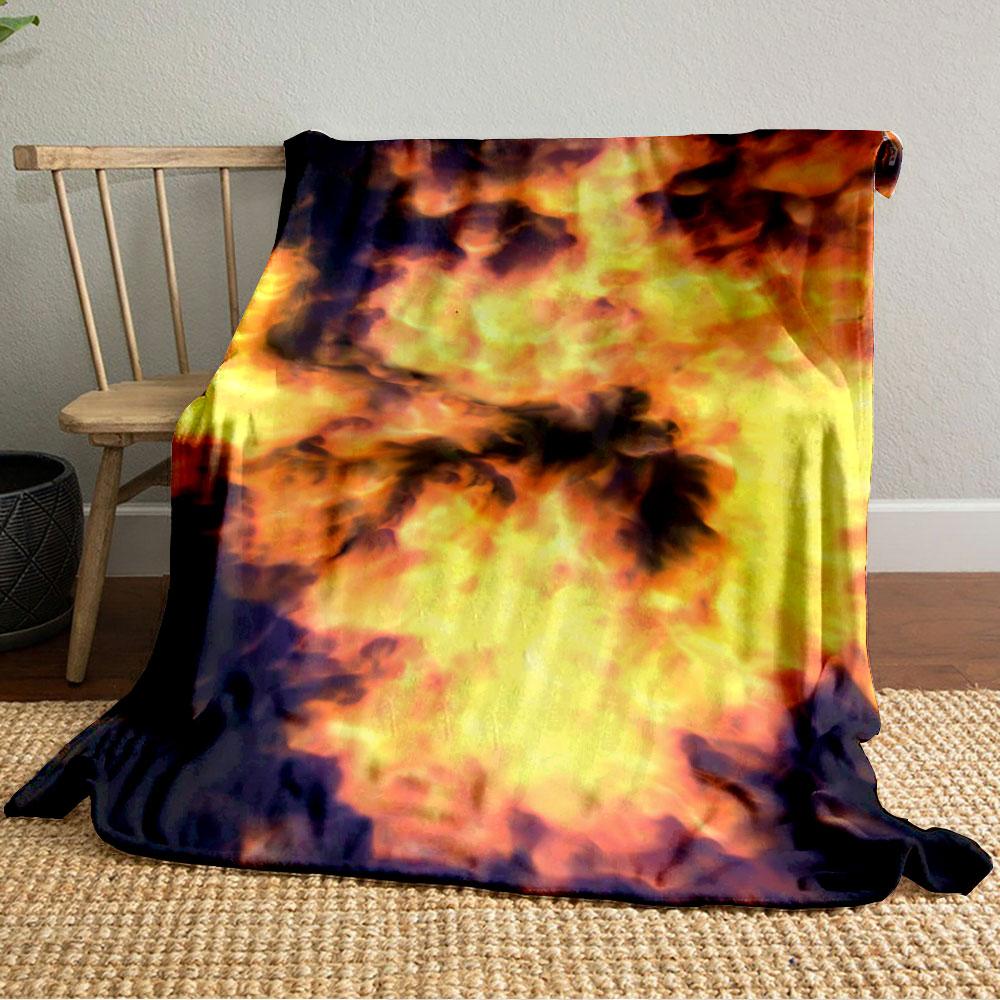 Fiery explosion with swirling yellow, orange, and black flame patterns. for all seasons blanket lunch break throw gift