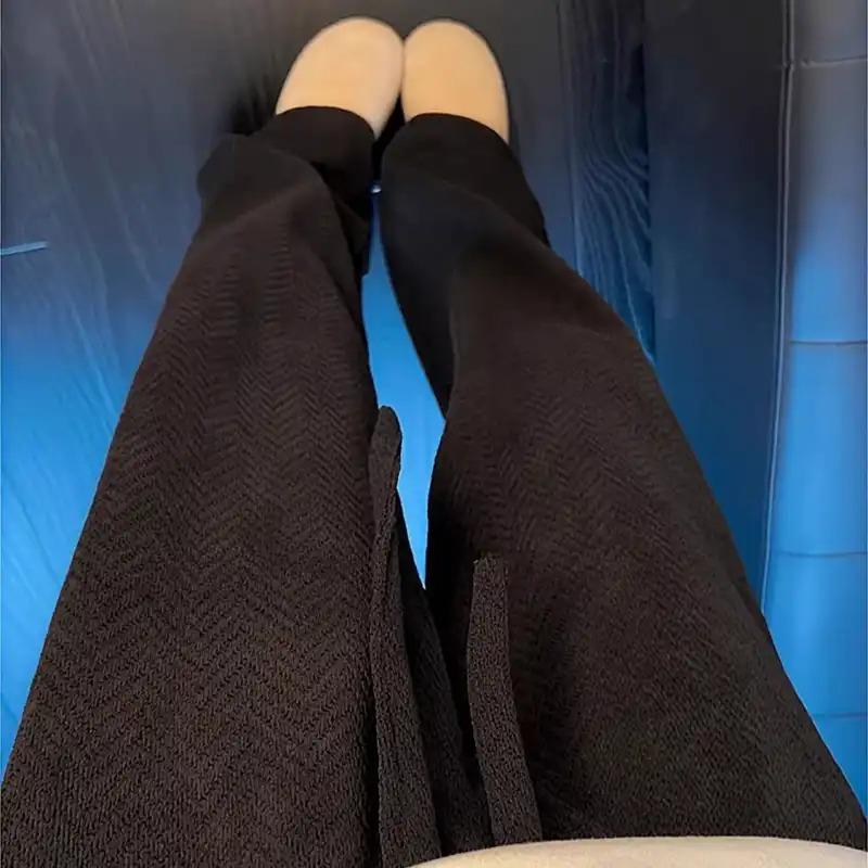 Женские расклешенные брюки в елочку с высокой талией и разрезом по низу, узкого кроя