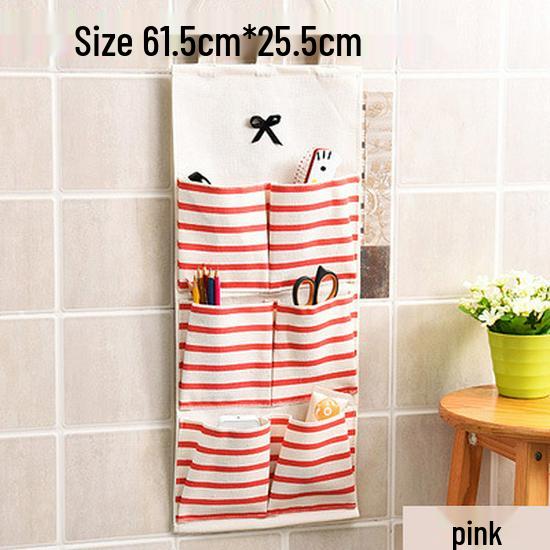 Полосатая настенная подвесная сумка для хранения из хлопка и льна с бантом и множеством карманов для кухни или ванной комнаты.