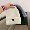 Autumn and Winter Smiley Face Knitted Hat Women's Outdoor Leisure Trend Versatile Warm Woolen Hat Warm Baotou Cold Hat