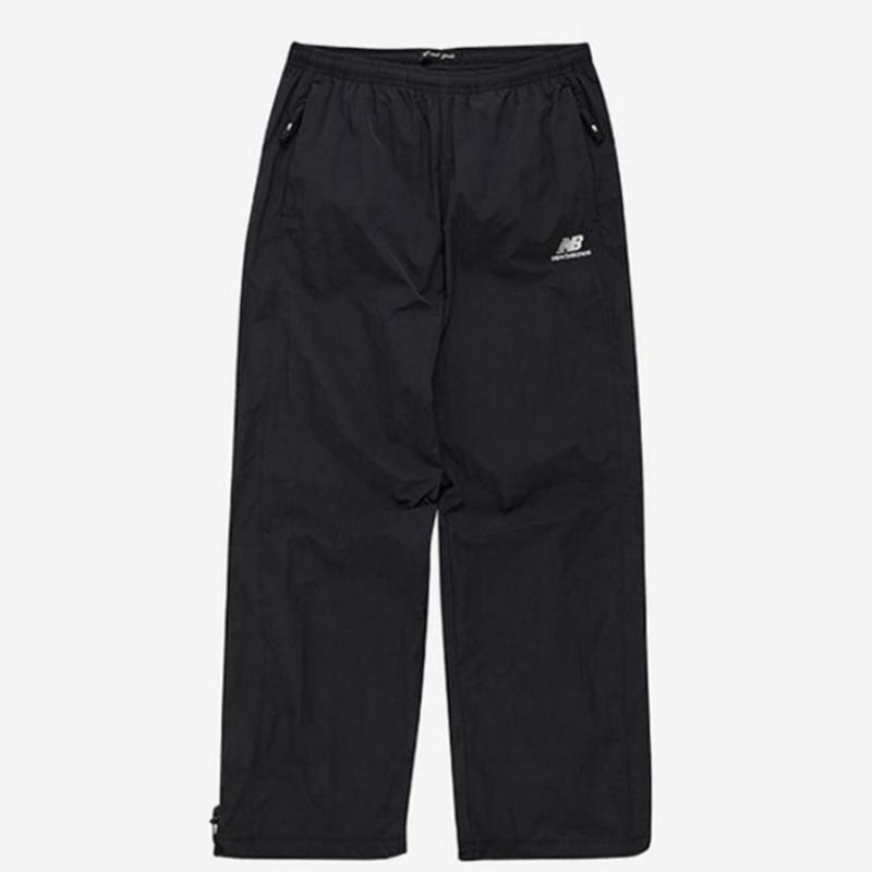 New Balance Унисекс Базовые нейлоновые брюки с логотипом Nbntc32703
