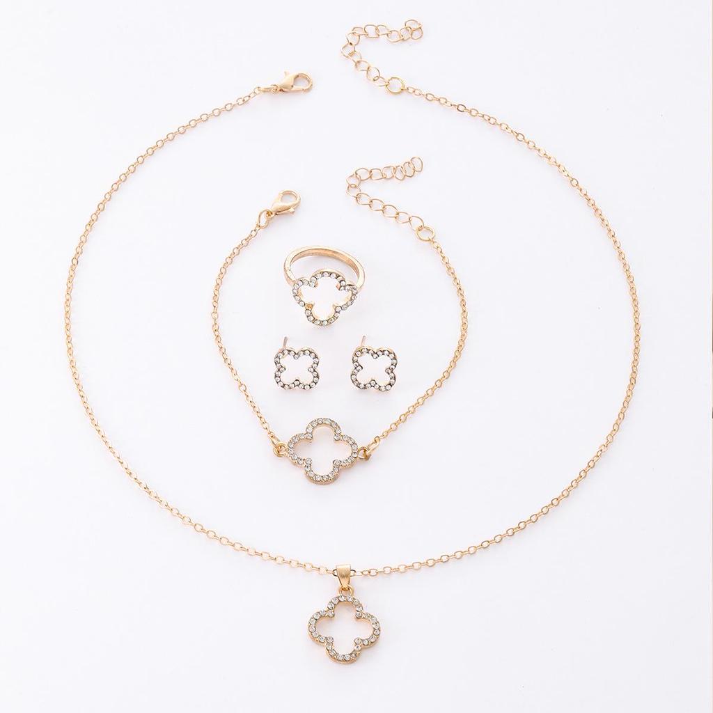 Комплект ювелирных изделий, пользующийся спросом: Модное ожерелье, браслет, серьги и кольцо с полыми бриллиантами в форме четырехлистного клевера