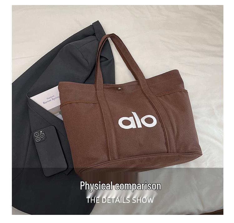 Versatile Large Capacity Canvas Tote: Fashionable Shoulder or Handheld School Bag for Commuting and Shopping