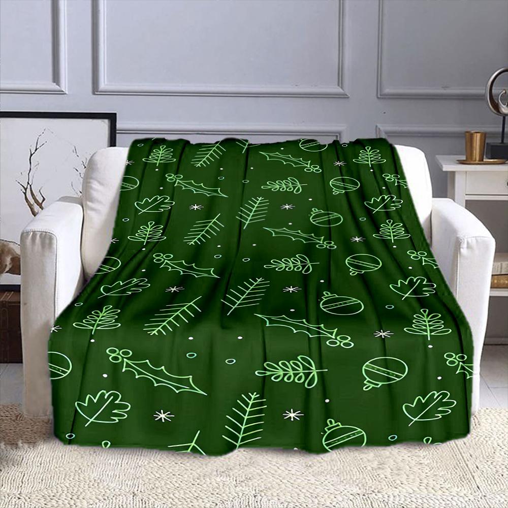 Christmas Green Leaves and Ornaments Design Patterned flannel blanket perfect for the bedroom living room, sofa, or a little nap