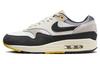 Air Max 1 Athletic Department Светлая кость Университетское золото FN7487-133