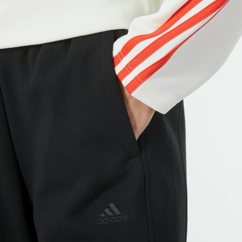 adidas Трикотажные джоггеры женские с логотипом и манжетами, черные IW1278