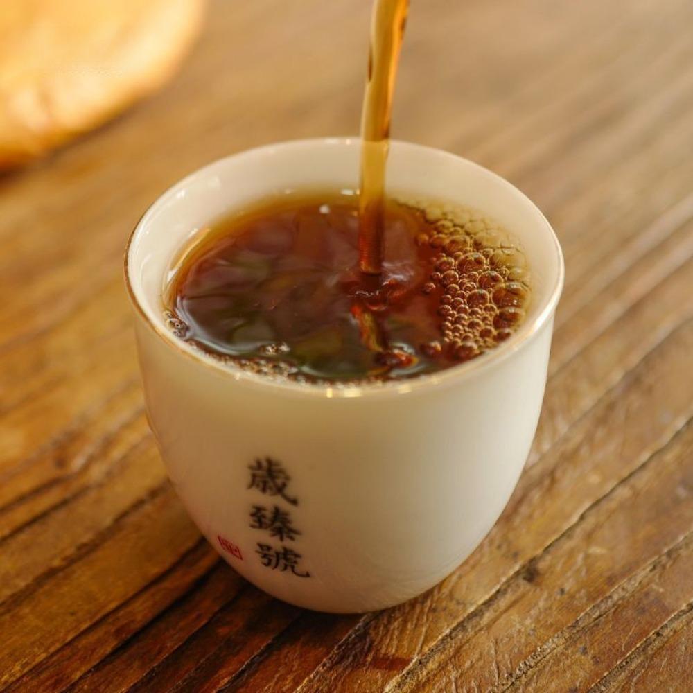 Чай Sui Zhen Hao Menghai Ripe PuErh Yunnan Aged Tree Brown Gold Cake 357г