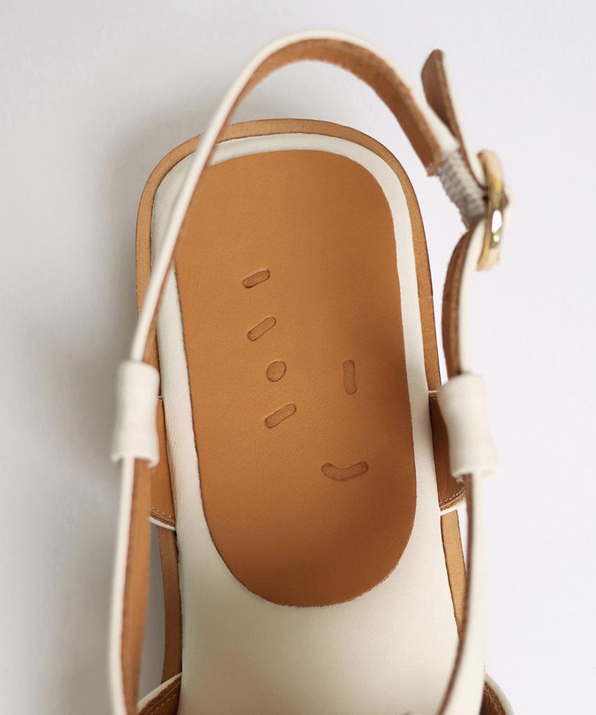 Heenn Open-Toe Fisherman Sandals. Cream