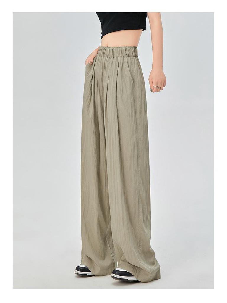 Женские весенние брюки из шёлка с высокой талией и складками — узкие, свободные, широкие с карманами