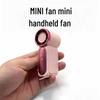 X688 High-Speed USB Rechargeable Mini Turbine Handheld Fan – Long Battery Life & Portable for Outdoor Use.