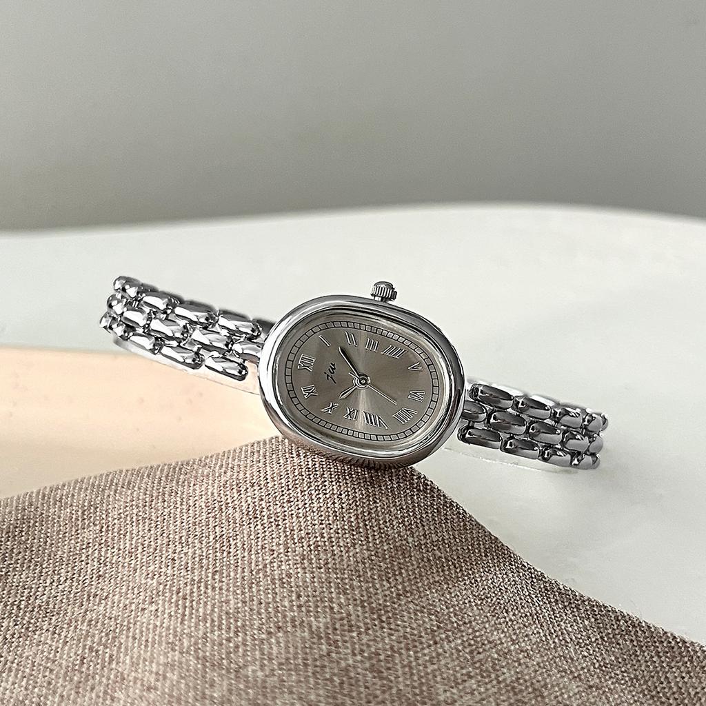 Authentic Jingwei Oval Vintage Women's Quartz Watch with Retro Roman Alloy Bracelet