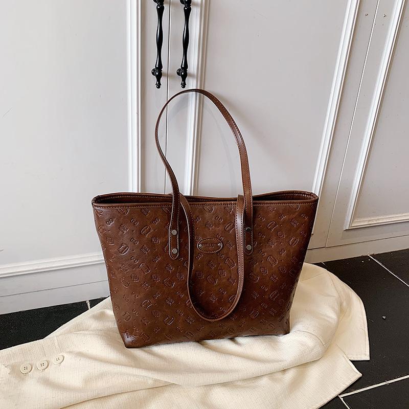 Retro tote bag women's large capacity 2025 new autumn and winter simple and versatile shoulder bag high-end sense work commuter bag