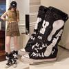 Wasteland wind niche graffiti canvas trousers boots women's 2024 new board shoes ins tide fried street middle tube pile boots