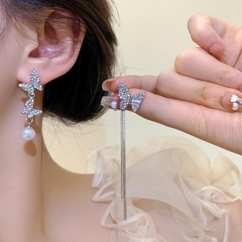 925 Silver Needle Asymmetrical Butterfly Tassel Earrings with Glittering Diamonds and Pearls