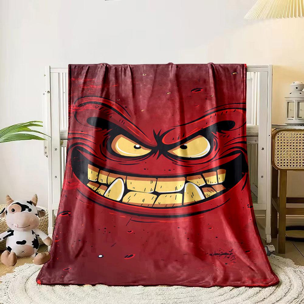 A menacing red face with sharp teeth, angry eyes, and bold expressions. for all seasons blanket lunch break throw gift