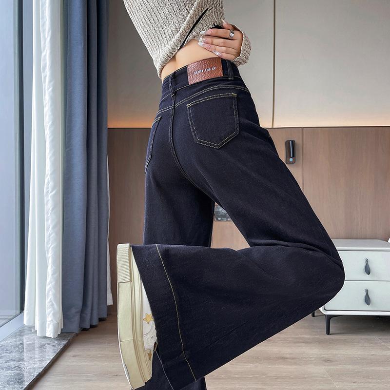 Retro elastic horn jeans women's autumn new super fire loose high waist belly Hong Kong style wide leg pants