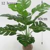 Искусственные растения Зеленые пальмовые листья Монстера Домашний сад Гостиная Спальня Балкон Украшения Тропические пластиковые искусственные растения Длинные