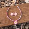 Bohemian vacation style egg flower necklace earrings set ins niche flower soft pottery color collarbone chain tide