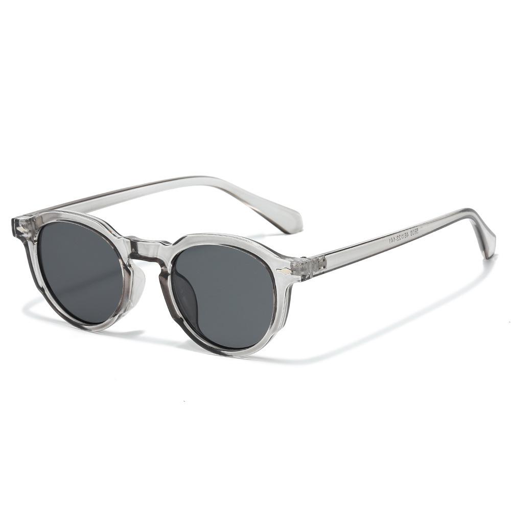 New round street fashion sunglasses, European and American retro simple metal tooth PC sunglasses