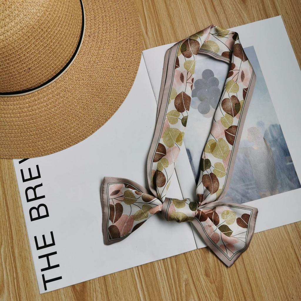 Korean version of the new tied bag thin and narrow strip small silk scarf women's printing creative small scarf women's four-season streamer wholesale