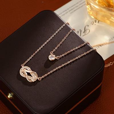 Набор ожерелья и серег «Бесконечность подкова из розового золота»