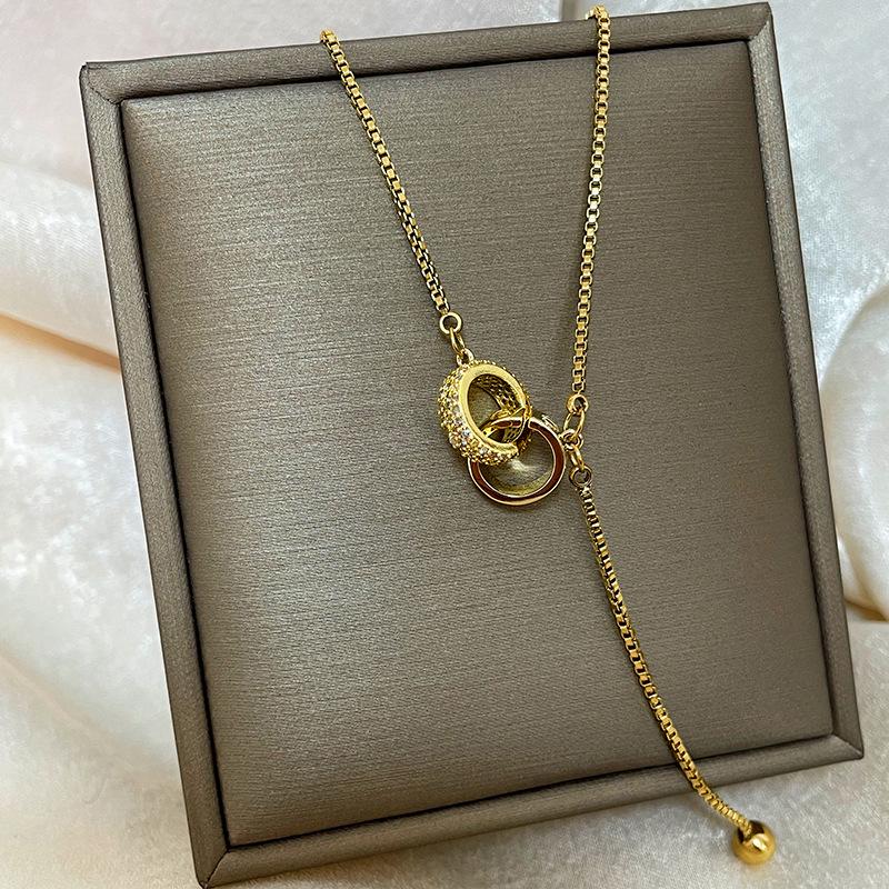 Позолоченная медь 18 карат, цепочка на ключицу с дизайном абака, тыквы-горлянки и лебедя.