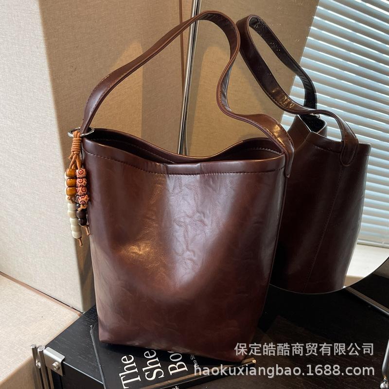 Сумка премиум-класса, нишевая, женская, осень-зима 2025, новая, ретро, универсальная, на плечо, сумка-мессенджер, повседневная и взрывная сумка-ведро