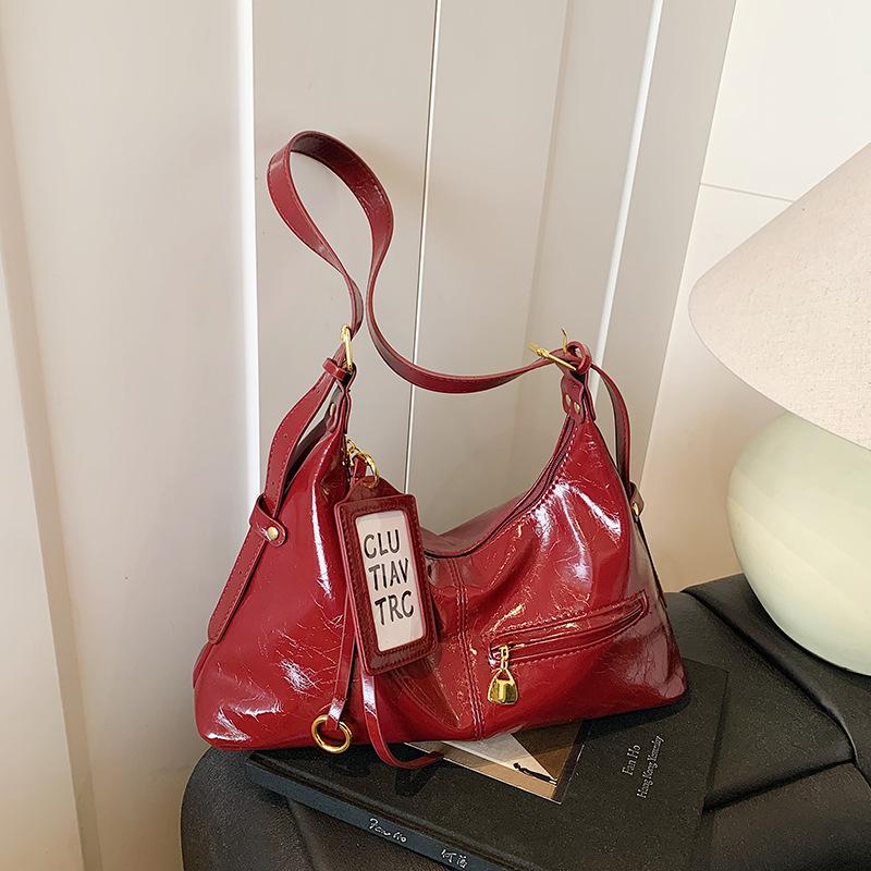 Ретро нишевая сумка подмышку женская 2025 новая трендовая корейская сумка-тоут простая вместительная сумка-мессенджер сумка для通勤