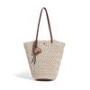 Summer New Versatile Large Capacity Single Shoulder Woven Bag Hollow Commuter Versatile Women's Bag Casual Fashion Beach Vacation Bag
