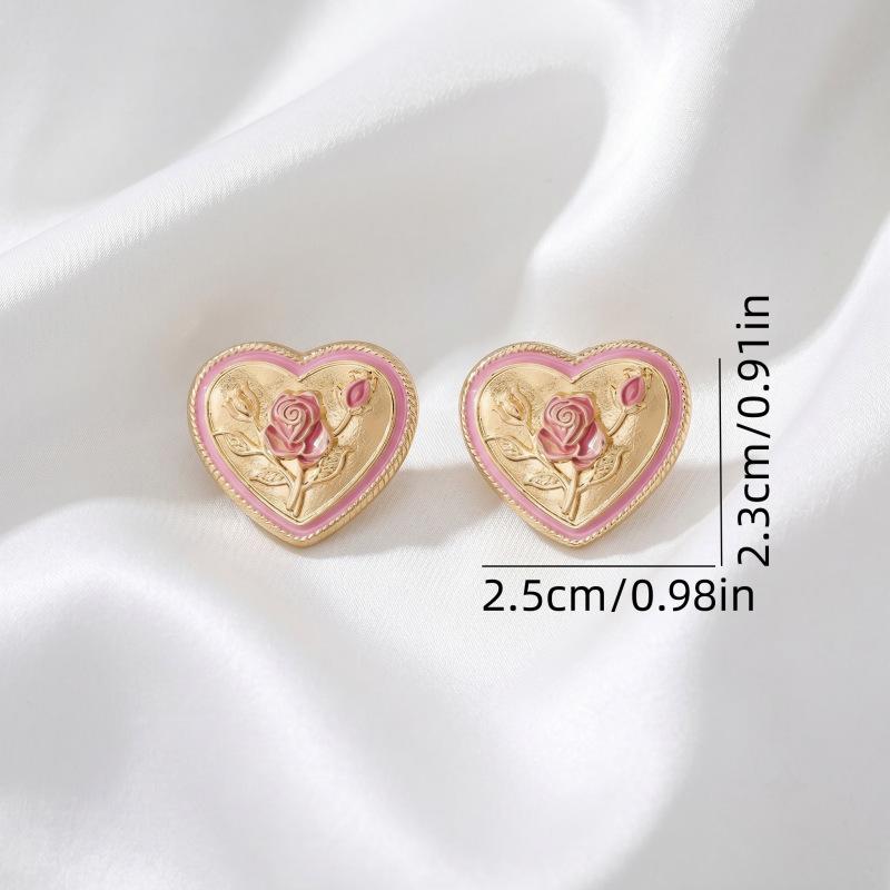 Simple and high-end pink drip glaze love ear buckle, small and exquisite versatile earrings, sweet small fresh and fashionable earrings.