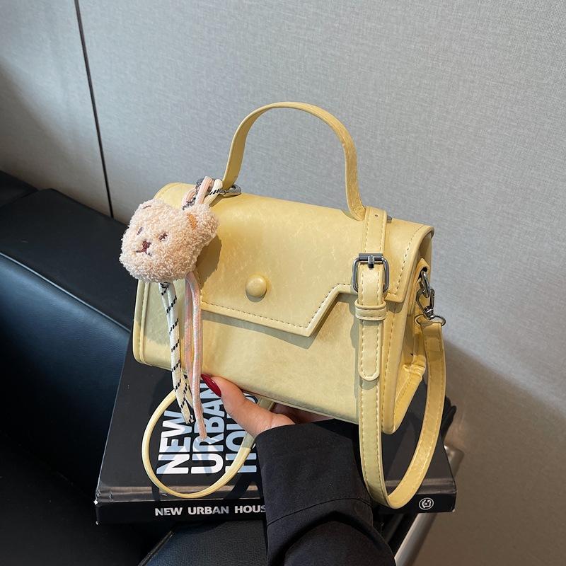 Модная портативная маленькая квадратная сумка женская сумка новая нишевая сумка для通勤 высокого класса универсальная на плечо сумка-мессенджер