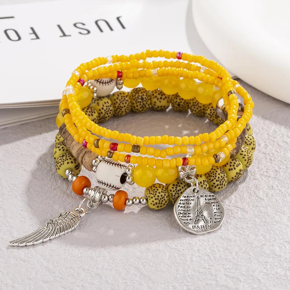 5Pcs Bohemian Colorful Rice Beads Bracelet Set For Women Eiffel Tower Wing Charm Elastic Bracelet Female Summer Vacation Jewelry