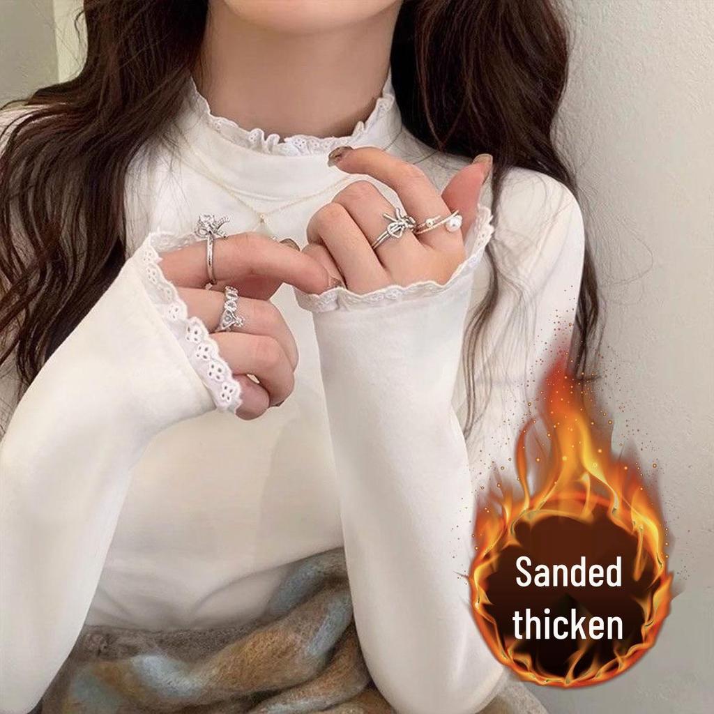 Женский облегающий вязаный свитер с полуворотом и кружевным плетением на осень и зиму