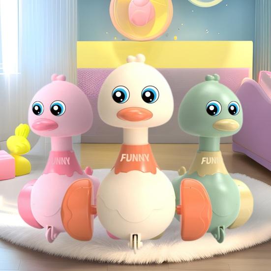 Детская игрушка «Гуляющий утенок» Нажми и едь Инерционный привод Оттягивание назад Вращающаяся на 360 градусов голова