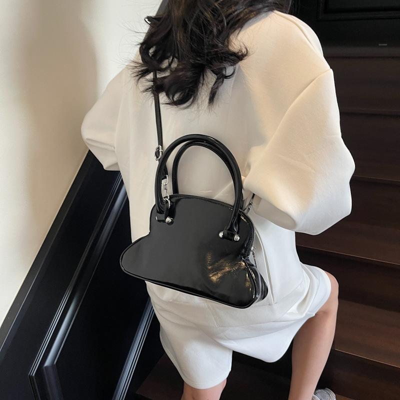 Премиальная нишевая сумка с чувством, женская весна-лето 2025, новая модная простая сумка-мессенджер, женская портативная сумка-боулинг