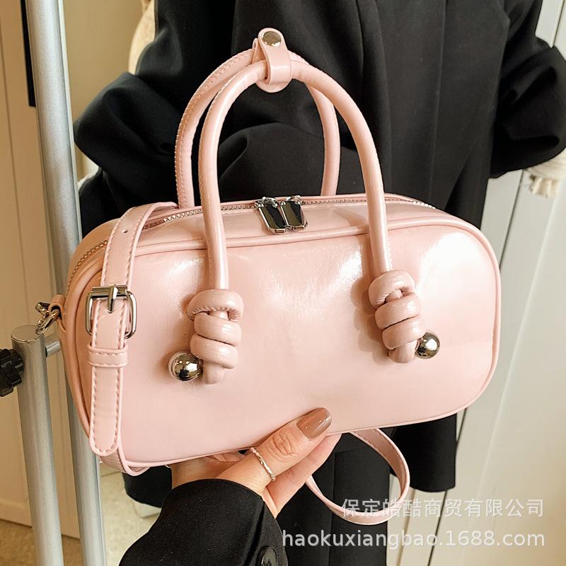 Сумка-бостон в высоком стиле, женская модная нишевая модель 2025, новая весенне-летняя сумка-мессенджер, портативная сумка для боулинга