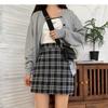 Юбка А-силуэта с высокой талией в клетку для женщин — тренд осени/зимы 2023 года