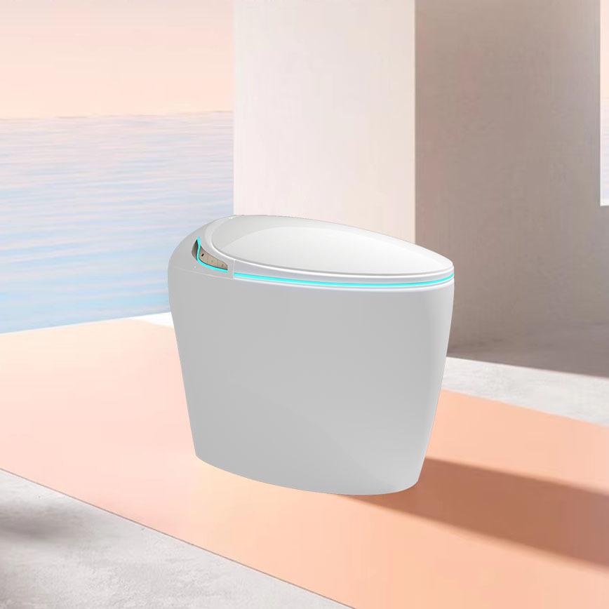 Egg-Shaped Smart Toilet with Sensor Flush, Heated Seat, Automatic Cover, and Aromatic Foam.