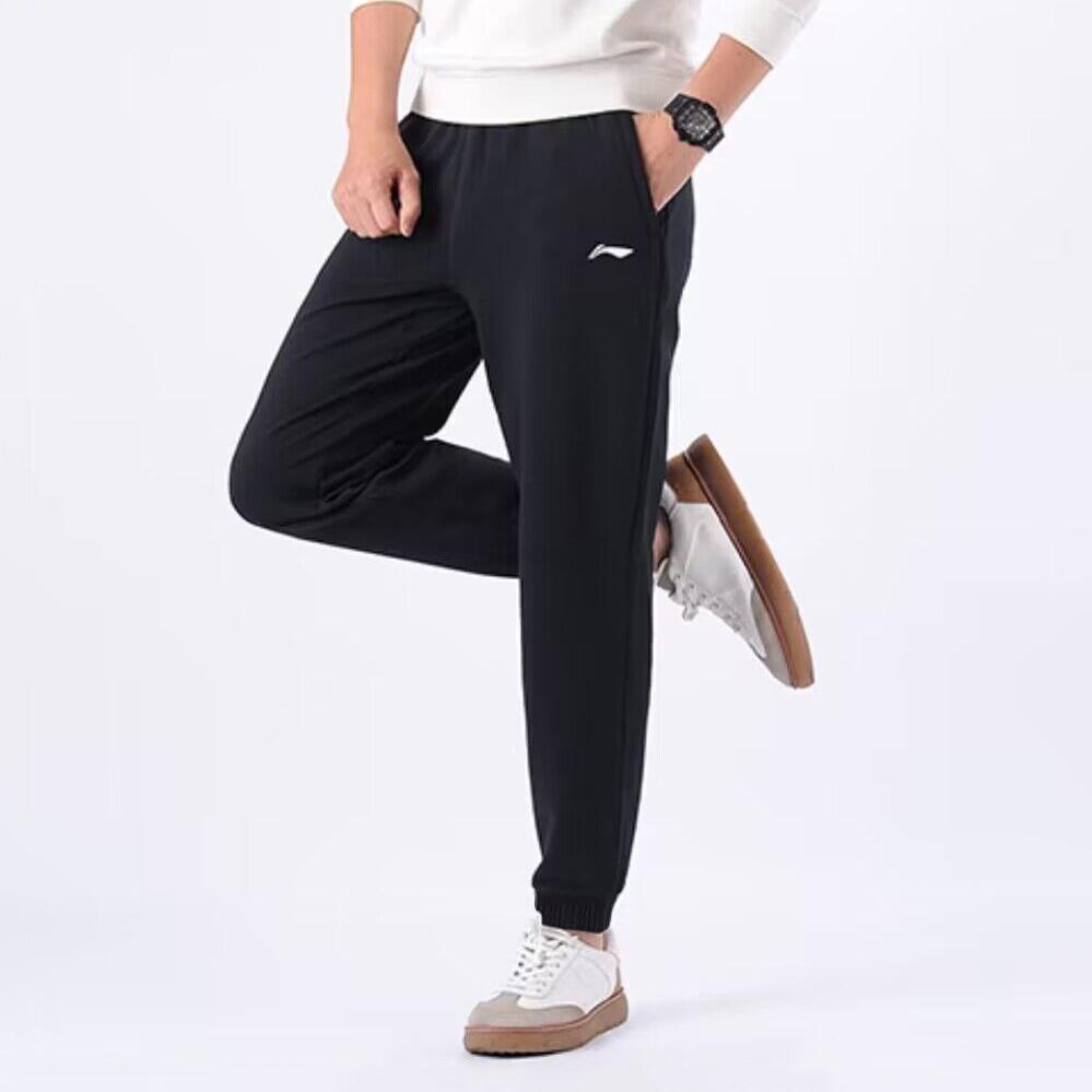 Штаны мужские спортивные трикотажные с манжетами Li Ning Badminton Series, однотонные, черные AKLT645-1