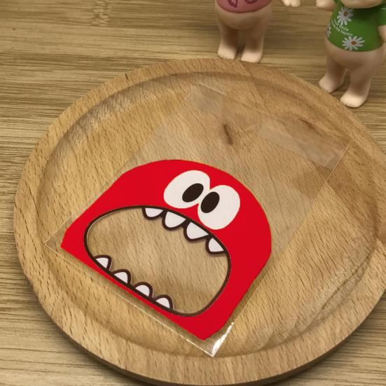 100 шт., самоклеящиеся подарочные пакеты с мультяшным монстром и принтом, печенье, конфеты