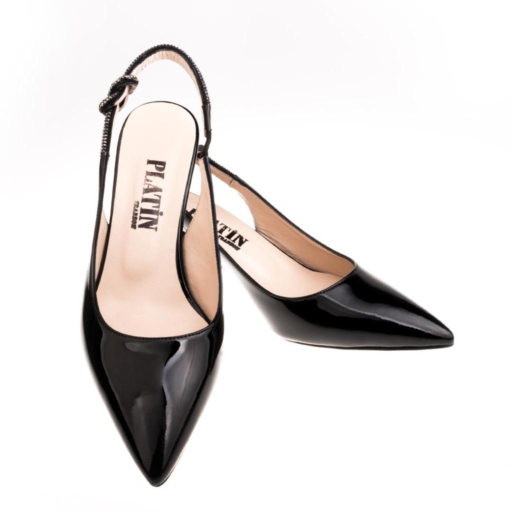 Женская обувь из натуральной кожи особого дизайна на среднем каблуке