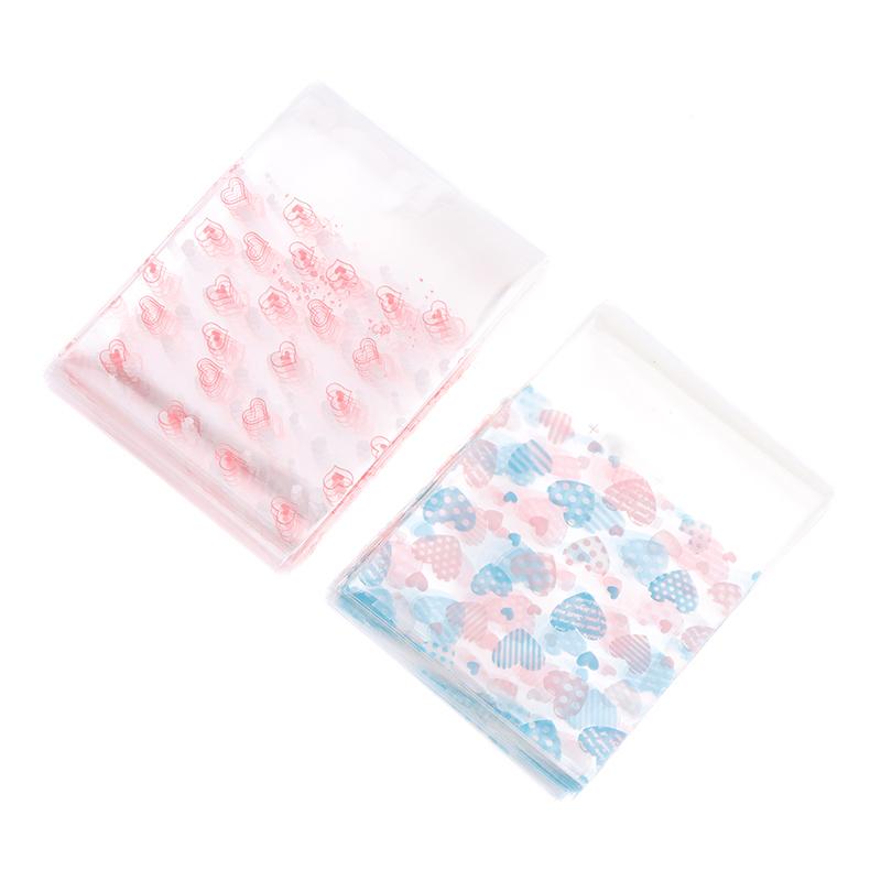 100 шт., прозрачный мешок для конфет в форме сердца, пластиковый пакет для печенья и закусок, упаковка для украшения выпечки, самоклеящаяся сумка