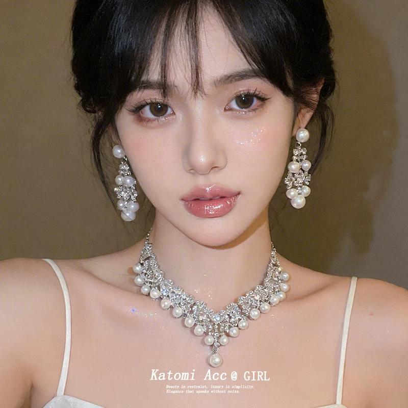 Light luxury pearl rhinestone fringed necklace women's 2026 new dress dinner accessories niche design clavicle chain