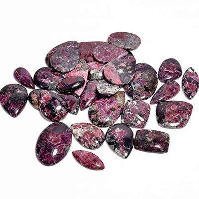 Партия драгоценных камней кабошона из натуральной эвдиалита яшмы, партия кабошонов разных форм и всех размеров, партия целебных драгоценных камней.