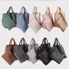 2025 Cross Border New Internet Celebrity Bag Hand Woven Tote Mother Bag Business Commuter PU Large Capacity Handbag