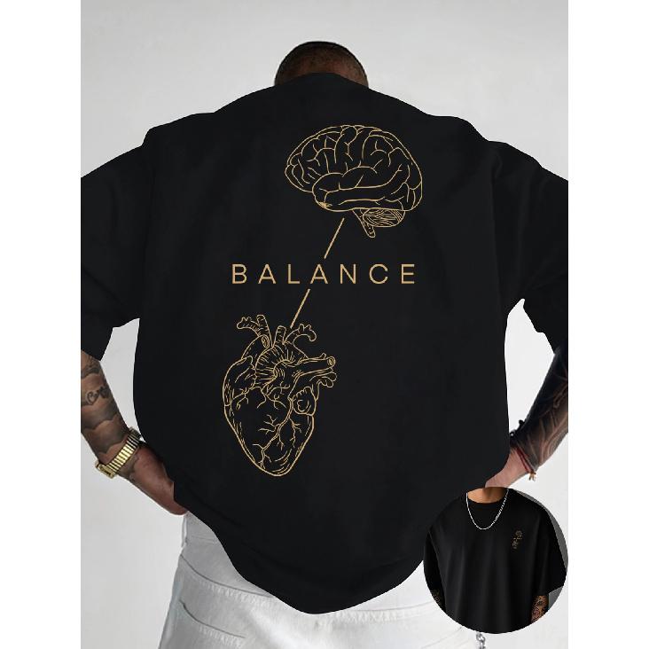 Men's black short sleeve t-shirt with gold brain and heart graphic, balance text, relaxed fit, crew neck, soft cotton feel, casual daily wear