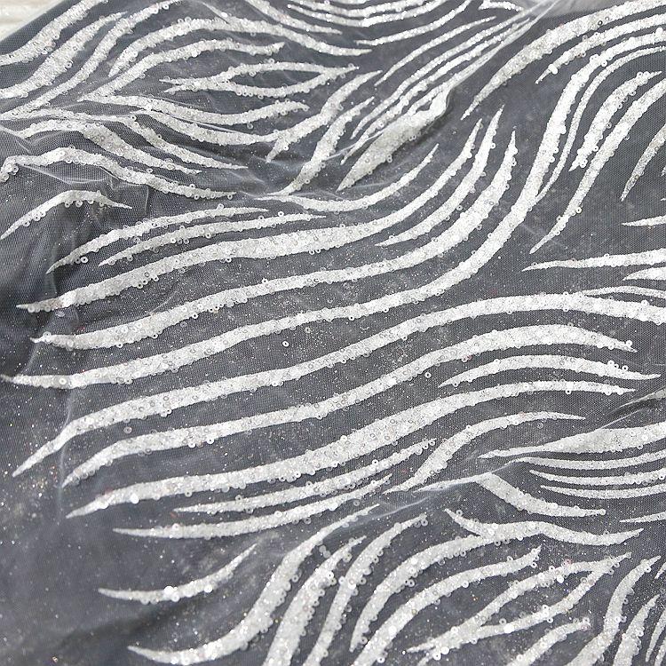 Shiny and anti-pilling embroidered lace fabric suitable for wedding dresses formal gowns and DIY handmade clothing fabrics
